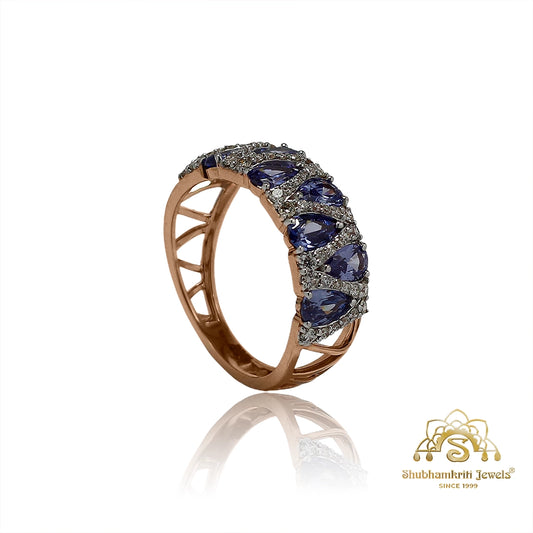 Blue sapphire diamond band ring in rose gold